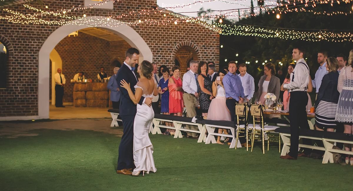 Bride and Groom First Dance as Husband and Wife at Wedding Venue Flora Farms in Cabo San Lucas Mexico