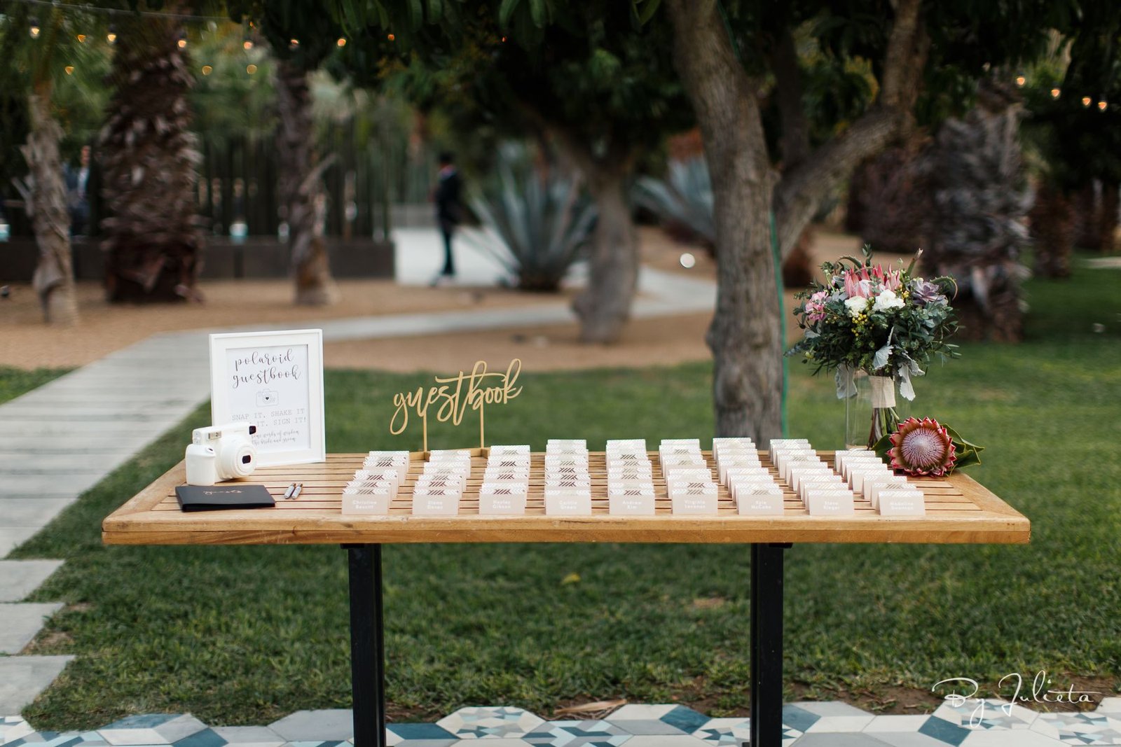 Escort Guest Signing Book Table at Acre Baja designed by Jesse Wolff and coordinated by Cabo Wedding Services