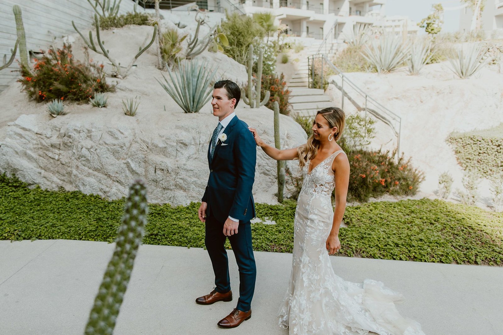This photo was taken right before the Wedding Ceremony as the Bride and Groom did their first Look. This photo was taken by the Pool at the Cape by Thompson Hotels, planned and designed by Cabo Wedding Services