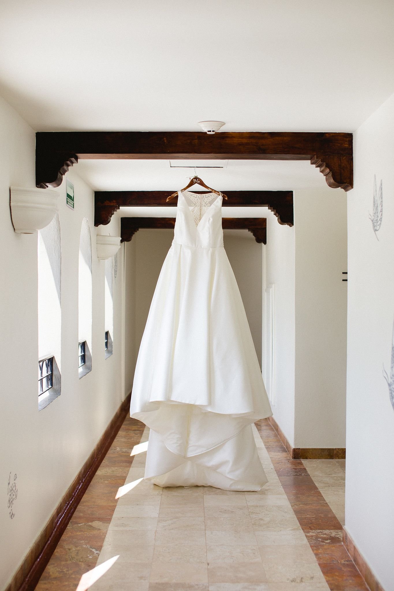 Wedding dressn worn by our beautiful bride who got ready at the Hilton Los Cabos in Mexico. Destination Wedding Planned and designed by Cabo Wedding Services.