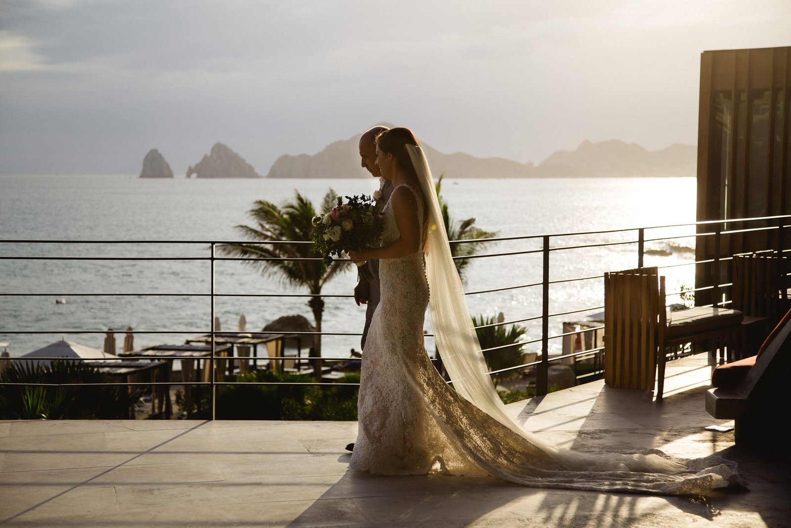 Bride only a few seconds to meet with her Groom for their wedding ceremony at The Cape Los cabos. The Sky was perfect for a romantic sunset and lighting was just perfect to photograph in. Cabo Wedding Services did the planning for this wedding 