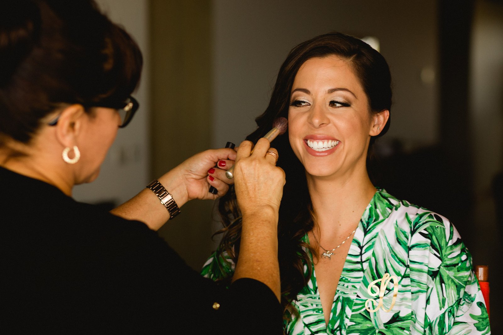 Bride getting her Hair and Makeup done by Alma Vallejo who is the owner of Cabo Makeup in Los Cabos Mexico. The Bride, Ashley, was so excited to be able to get married to the love of her life, Matthew, and you could tell. She was over joyed. Wedding Planning by Cabo Wedding Services