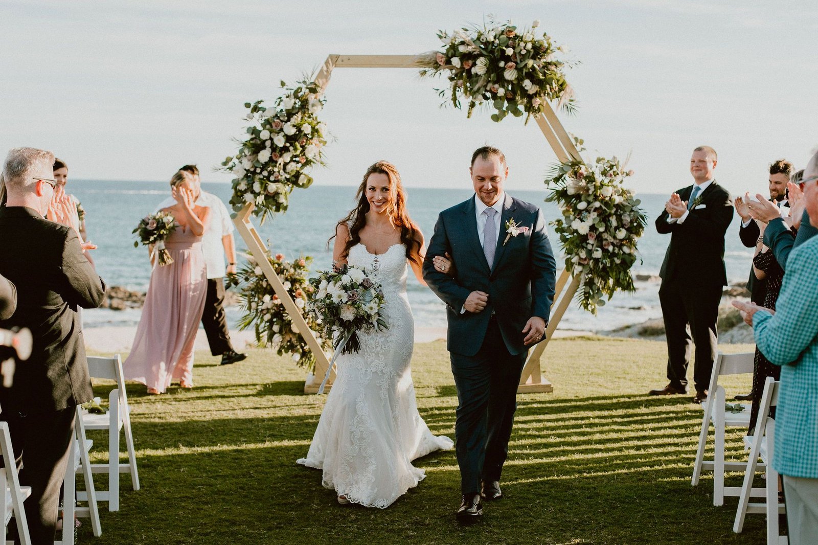 Bride and Groom after the Wedding Ceremony at Cabo del Sol. Destination Wedding Planning by Cabo Wedding Services. Wedding Designer Jesse Wolff