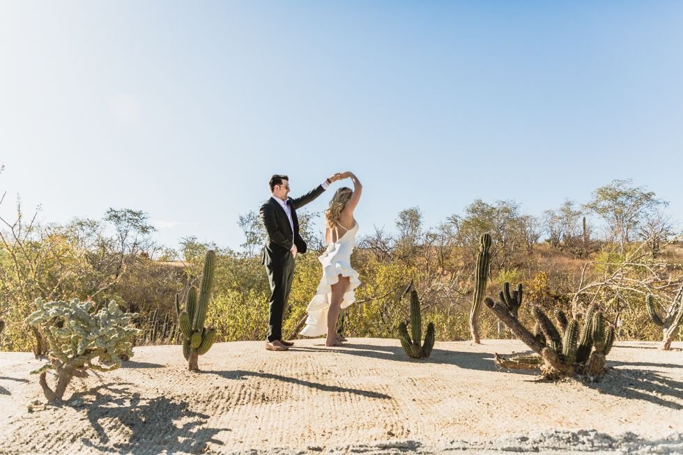 Lauren and James, bride and groom, during their photo session in Los Cabos Mexico. Wedding Venue was The Cape and they did their photo session around Los Cabos, in the Desert.