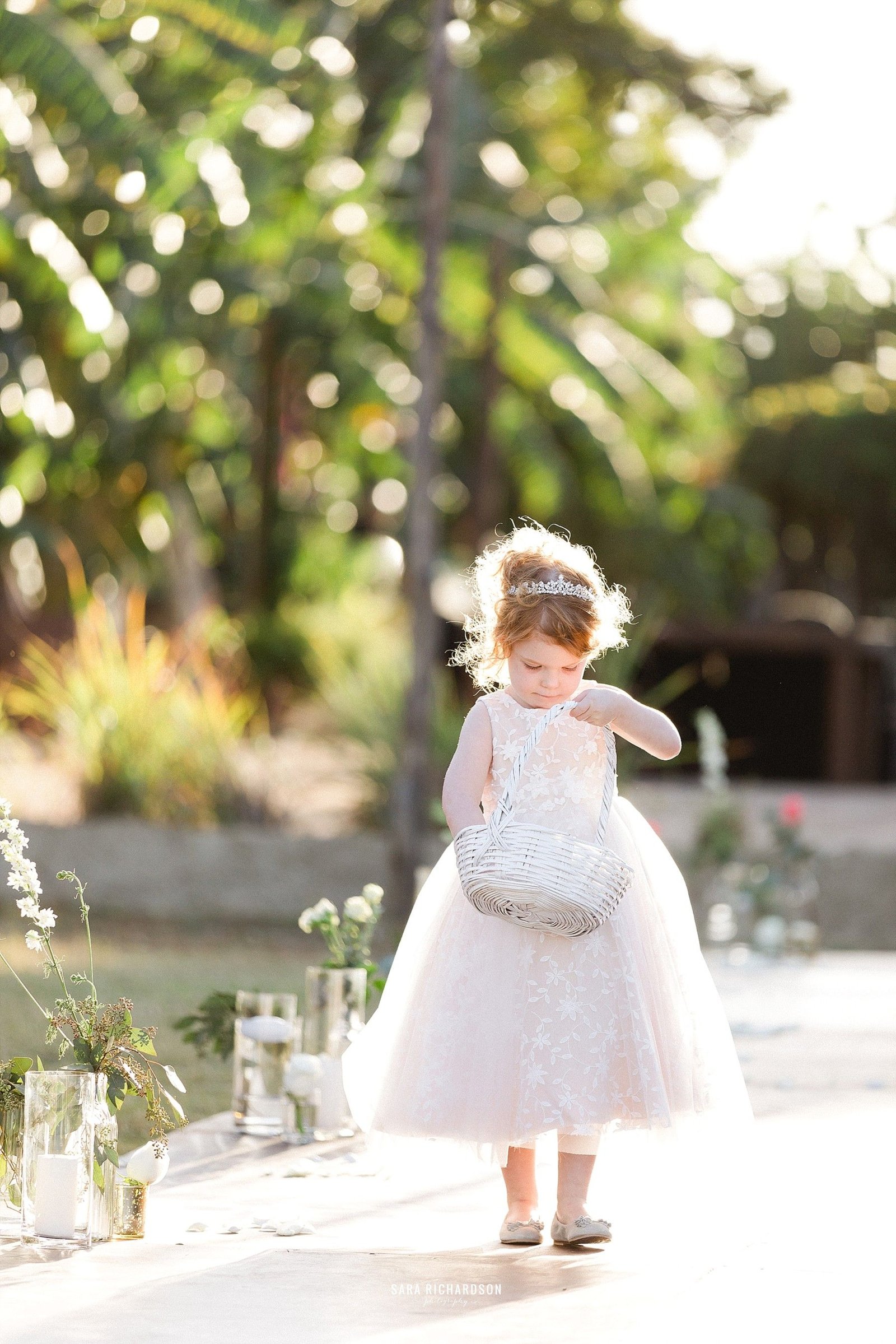 The cutest flower girl ever! She walked down that aisle and owned it! The Bride and Groom's photographer, Sara Richardson, was able to capture such beautiful moments!