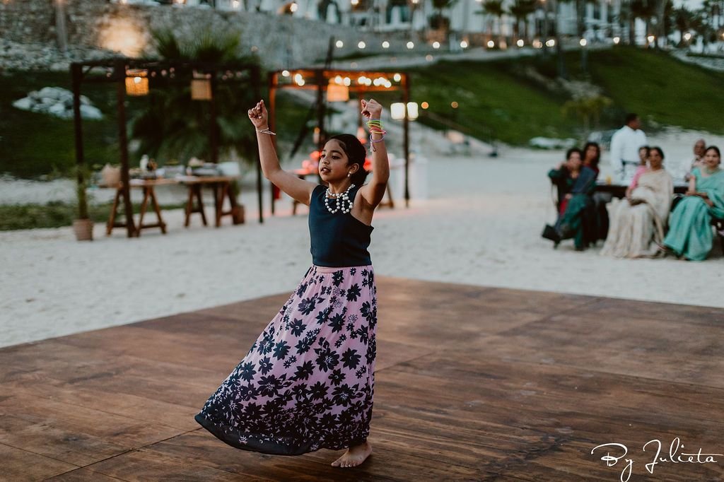 Cousin of the Bride doing a choreographed dance during the Sangeet at Hilton Los Cabos.