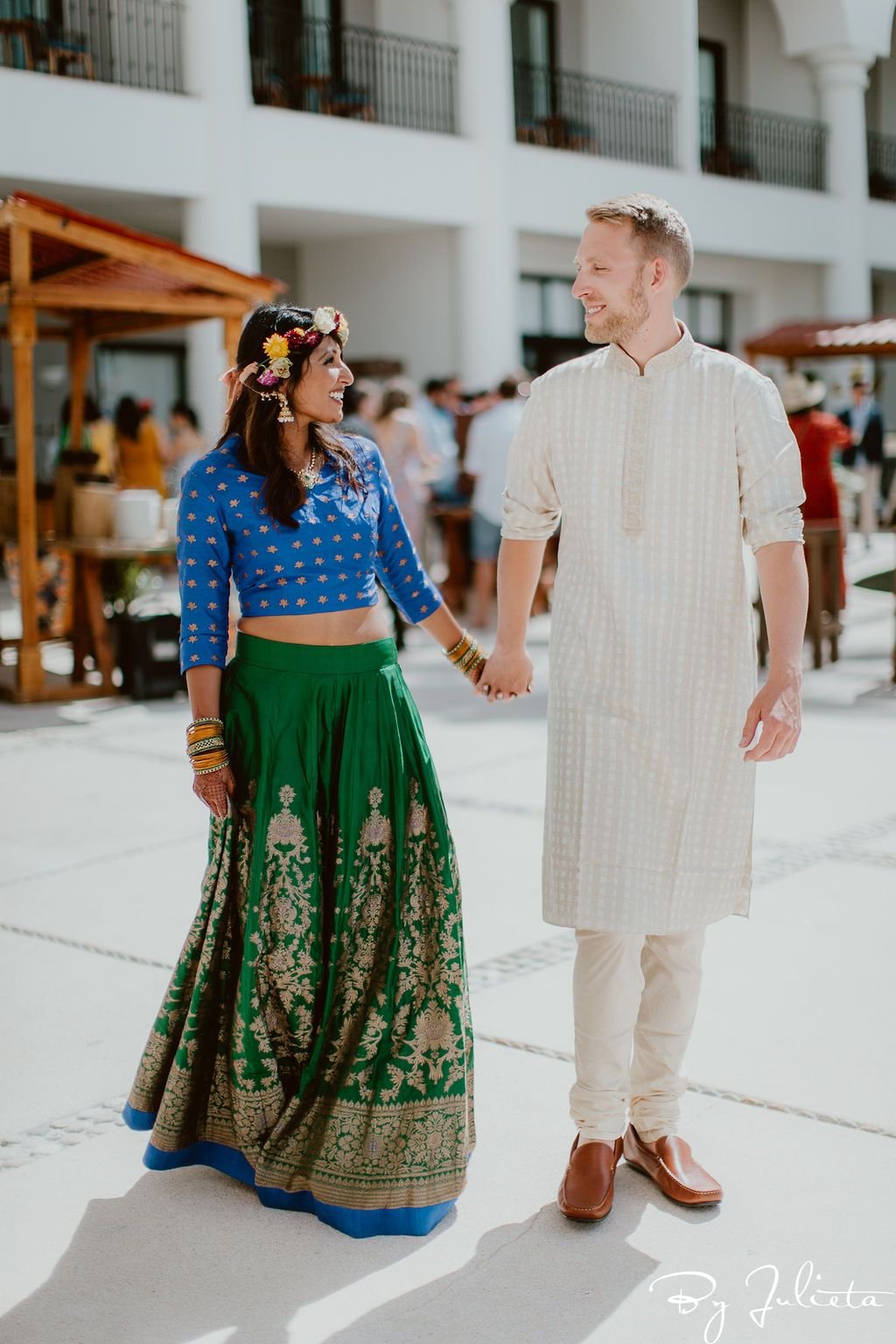 Bride and Groom posing for the amazing Julieta Amezcua, who was their photographer for their wedding weekend. They had their Haldi and Sangeet at the Hilton Los Cabos, and then their beautiful wedding at Flora Farms.