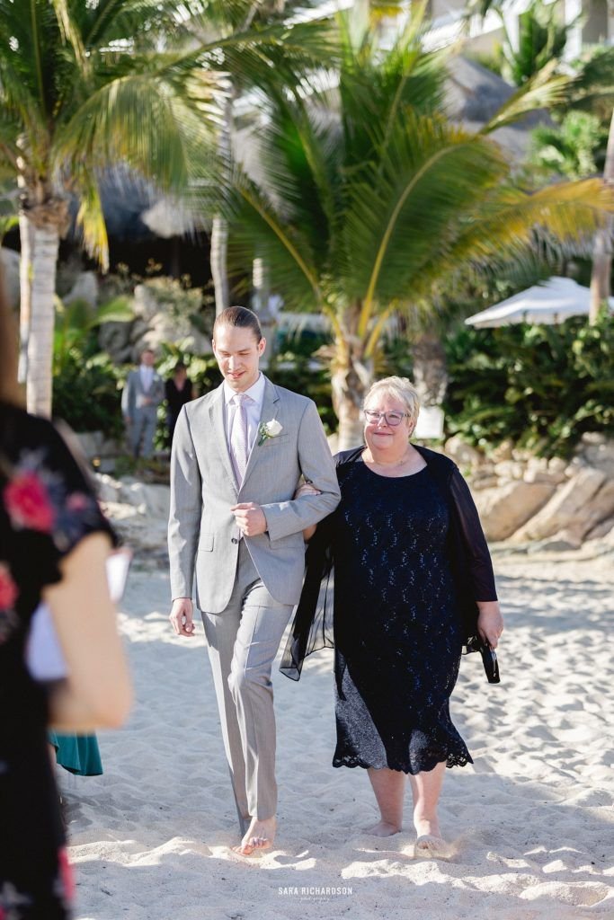 Grandmother of Groom was walking down with Grandson at her other Grandsons Destination Wedding in Los Cabos, Mexico. 