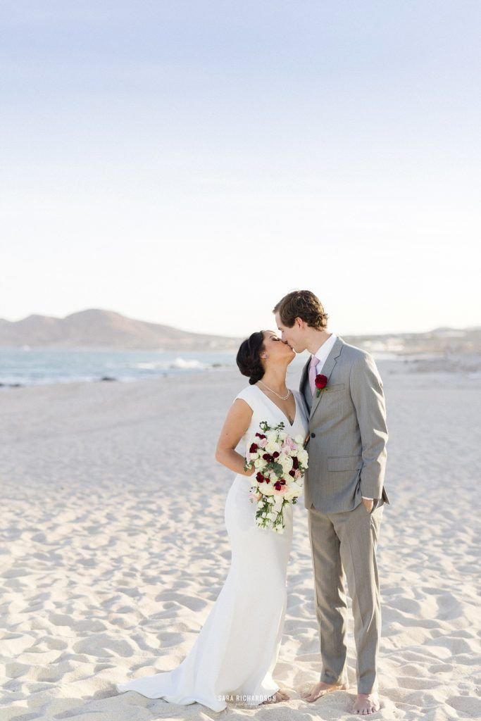 Bride and Groom Kissing right after their destination Wedding in Los Cabos Mexico