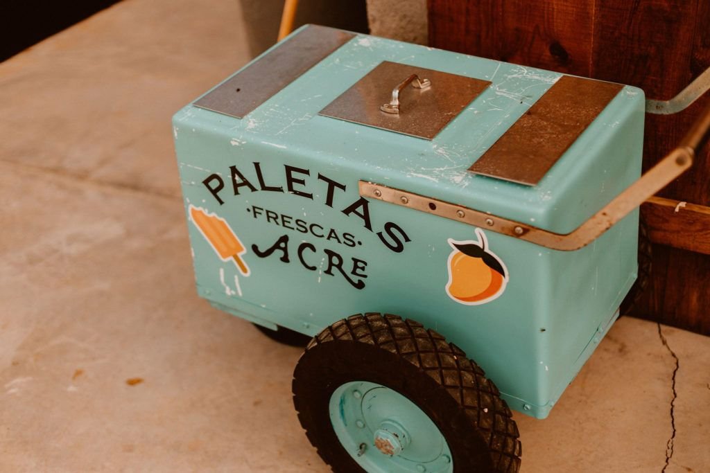 Always fun to have a Paletas Cart at your wedding. Paleta means popsicle, and who doesn't want something refreshing when it is a little warm outside, in the middle of the dessert and tropical oasis? I would!