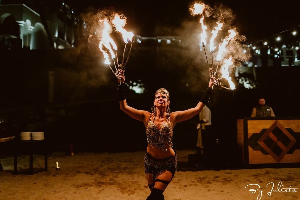 Fire dancers at the Hilton Los Cabos in Mexico, during a Destination Wedding, Planned by Jessica Wolff from Cabo Wedding Services.