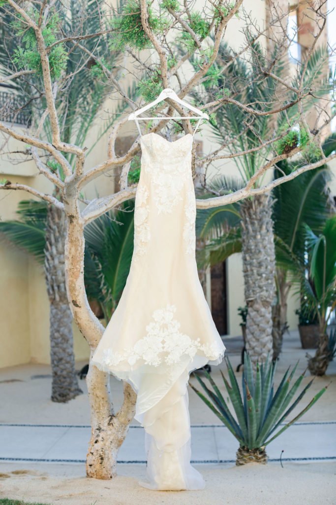 Brides Vera Wang Dress hanging up at the Waldorf Astoria, at her Destination Wedding in Los Cabos, Mexico. Wedding Planning was done by Jessica Wolff.