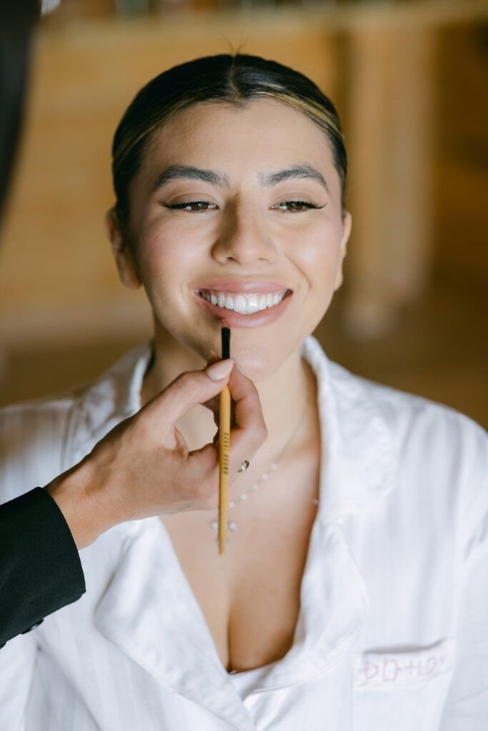 Bride getting her Hair and makeup done by Blanc Bridal Salon coordinated by Cabo Wedding Services at Waldorf Astoria in Los Cabos Mexico